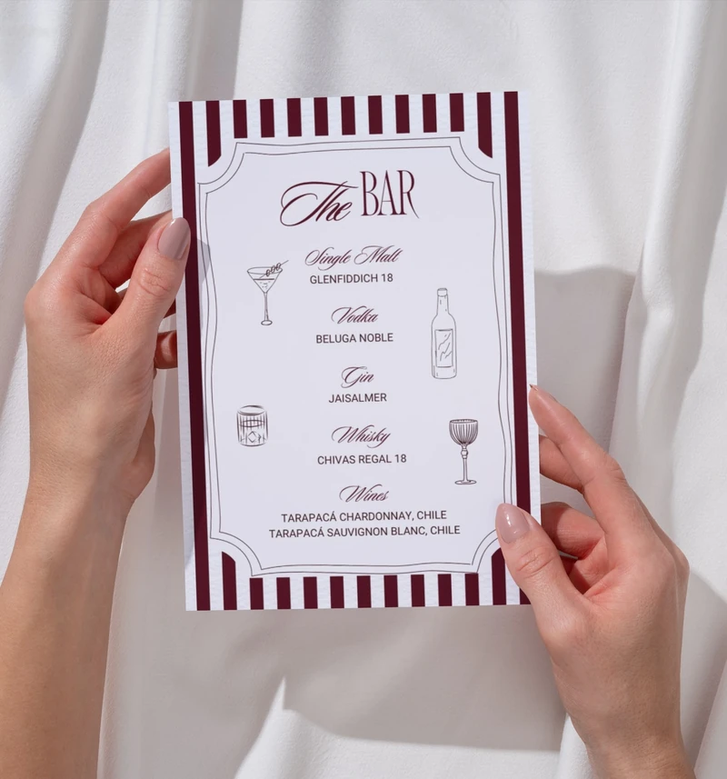 Photograph of a hand holding The Bar menu, repeated in the follow-up sequence.